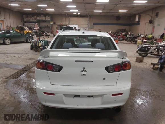 2014 Mitsubishi Lancer GT with VIN JA32U8FWXEU016230, listed as a IAAI auction lot 41379899 with 108,511 mi miles. Bid and sale history available at carsss.com. Image 16.