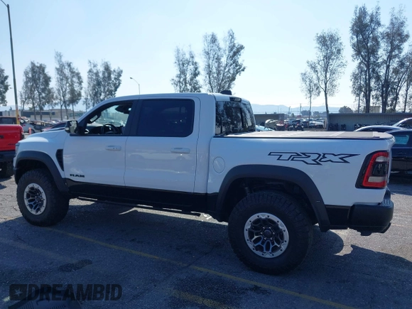 2022 Ram 1500 TRX with VIN 1C6SRFU93NN172647, listed as a IAAI auction lot 41539123 with 18,016 mi miles and . Bid and sale history available at DreamBid. Image 14.