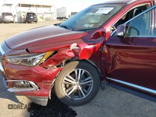 2020 Infiniti QX60 Luxe with VIN 5N1DL0MM0LC511566, listed as a IAAI auction lot 40879519 with 90,479 mi miles and . Bid and sale history available at DreamBid. Image 6.