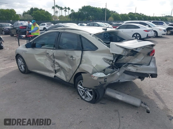 2015 Ford Focus SE with VIN 1FADP3F29FL292655, listed as a IAAI auction lot 41090945 with 106,060 mi miles. Bid and sale history available at carsss.com. Image 3.