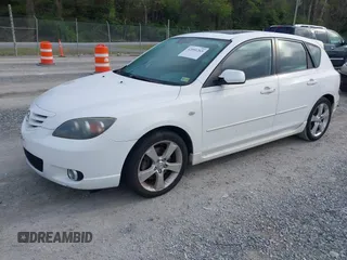 2004 Mazda 3 s with VIN JM1BK143941129870, listed as a IAAI auction lot 42091265 with 198,408 mi miles and . Bid and sale history available at DreamBid. Image 2.