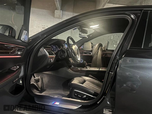 2016 BMW 7 Series 750i xDrive with VIN WBA7F2C51GG415746, listed as a Copart auction lot 50784393 with 73,117 mi miles. Bid and sale history available at carsss.com. Image 5.