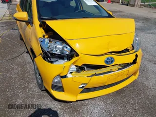 2014 Toyota Prius One z VIN JTDKDTB31E1066984, wystawiony jako IAAI lot #42261574 z przebiegiem 163 378 mil mil oraz . Historia ofert i sprzedaży dostępna na DreamBid. Obrazek 6.