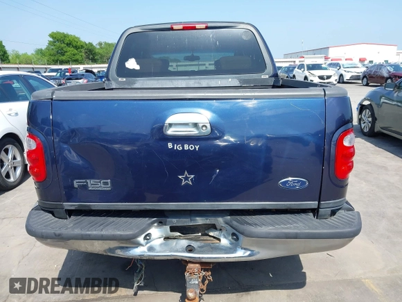 2003 Ford F-150 XLT with VIN 1FTRW07L33KC83234, listed as a IAAI auction lot 41894573 with 215,232 mi miles. Bid and sale history available at carsss.com. Image 16.