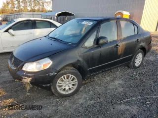 2013 Suzuki SX4 LE with VIN JS2YC5A34D6102748, listed as a Copart auction lot 74253634 with 44,386 mi miles and Salvage Title. Bid and sale history available at carsss.com. Image 1.