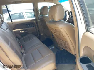 2007 Honda Pilot EX-L with VIN 5FNYF18567B032406, listed as a IAAI auction lot 42120219 with 205,687 mi miles. Bid and sale history available at carsss.com. Image 8.