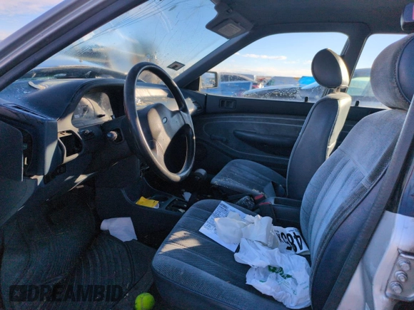 1993 Ford Escort z VIN 1FAPP15J7PW181838, wystawiony jako Copart lot #88717755 z przebiegiem 6 017 mil mil oraz Szkoda całkowita • Salvage title. Historia ofert i sprzedaży dostępna na DreamBid. Obrazek 7.