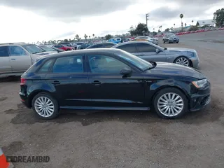 2016 Audi A3 e-tron Premium with VIN WAUUPBFF6GA138034, listed as a IAAI auction lot 41524489 with 90,453 mi miles. Bid and sale history available at carsss.com. Image 13.