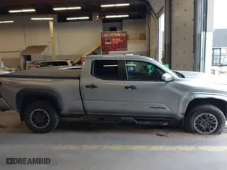 2024 Toyota Tacoma 4WD SR5 with VIN 3TMLB5JN4RM071338, listed as a IAAI auction lot 41742236 with 9,367 mi miles. Bid and sale history available at carsss.com. Image 13.