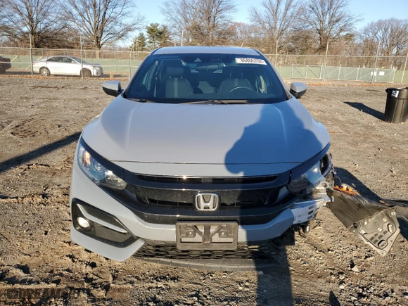 2021 Honda Civic Hatchback Sport with VIN SHHFK7H42MU419462, listed as a Copart auction lot 86806704 with 38,718 mi miles and Salvage Title. Bid and sale history available at carsss.com. Image 5.