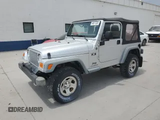 2004 Jeep Wrangler X z VIN 1J4FA39S94P747200, wystawiony jako Copart lot #64617535 z przebiegiem 151 224 mil mil oraz Czysty tytuł • Clean title. Historia ofert i sprzedaży dostępna na DreamBid. Obrazek 1.