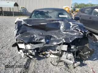 2024 BMW i5 eDrive40 with VIN WBY33FK04RCR49355, listed as a Copart auction lot 55828475 with Not Provided miles and Salvage Title. Bid and sale history available at DreamBid. Image 5.