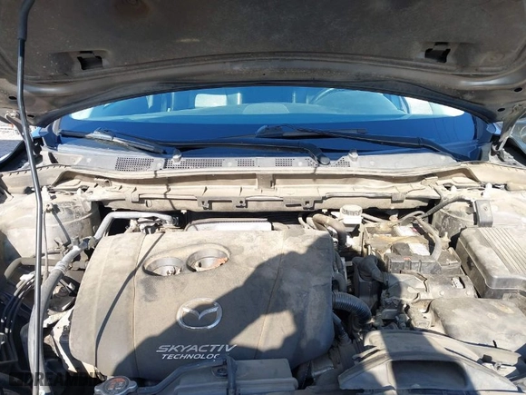 2014 Mazda CX-5 Grand Touring with VIN JM3KE2DY7E0405115, listed as a IAAI auction lot 41939899 with 147,452 mi miles. Bid and sale history available at carsss.com. Image 10.