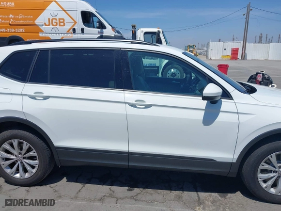 2019 Volkswagen Tiguan S with VIN 3VV1B7AX1KM101407, listed as a IAAI auction lot 42032761 with 51,868 mi miles. Bid and sale history available at carsss.com. Image 13.
