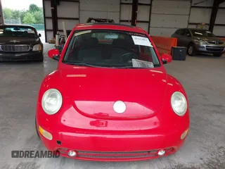 2003 Volkswagen Beetle GLS z VIN 3VWCK21C93M421676, wystawiony jako IAAI lot #42212863 z przebiegiem 115 134 mil mil oraz . Historia ofert i sprzedaży dostępna na DreamBid. Obrazek 6.