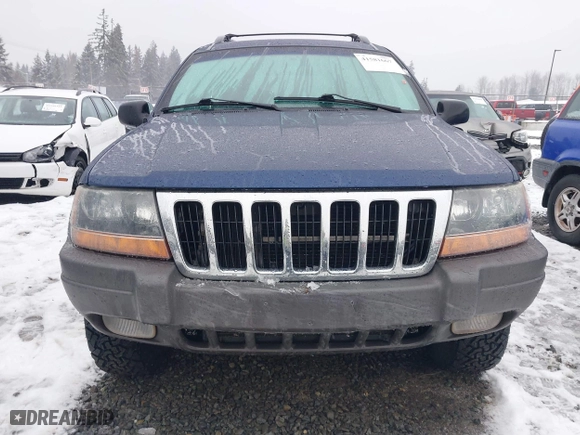 2001 Jeep Grand Cherokee Laredo with VIN 1J4GW48N21C730703, listed as a IAAI auction lot 41581667 with 111,054 mi miles. Bid and sale history available at carsss.com. Image 13.