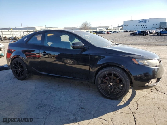 2012 Kia Forte Koup EX with VIN KNAFU6A22C5639812, listed as a Copart auction lot 84951064 with 131,005 mi miles and Salvage Title. Bid and sale history available at carsss.com. Image 4.