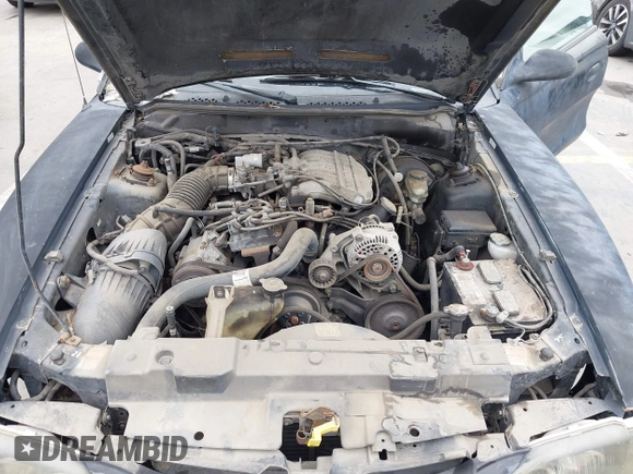 1998 Ford Mustang with VIN 1FAFP4042WF255177, listed as a IAAI auction lot 42421207 with 166,864 mi miles and . Bid and sale history available at DreamBid. Image 10.