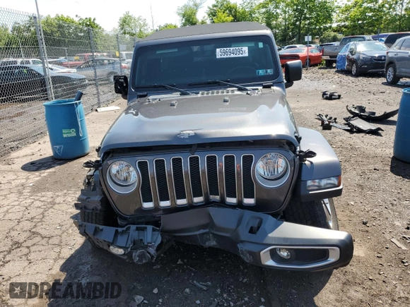 2022 Jeep Wrangler Unlimited Sahara with VIN 1C4HJXENXNW244773, listed as a Copart auction lot 59694095 with 21,871 mi miles and Salvage title. Bid and sale history available at DreamBid. Image 5.
