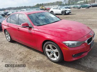 2014 BMW 3 Series 320i xDrive with VIN WBA3C3G5XENS69749, listed as a IAAI auction lot 42052481 with 112,306 mi miles. Bid and sale history available at carsss.com. Image 1.