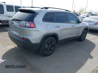 2021 Jeep Cherokee Altitude with VIN 1C4PJMLBXMD157985, listed as a IAAI auction lot 41916748 with 71,401 mi miles. Bid and sale history available at carsss.com. Image 4.
