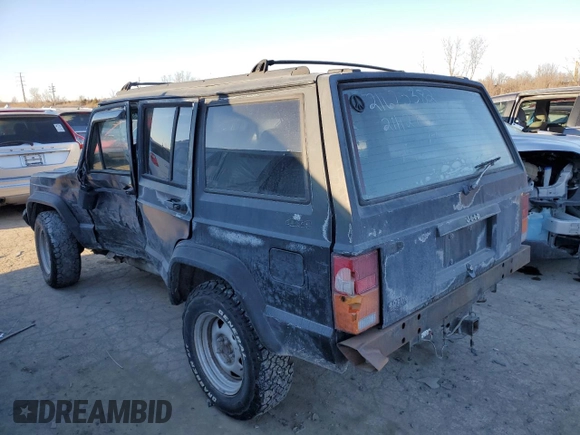 1996 Jeep Cherokee Sport with VIN 1J4FJ68S8TL244251, listed as a Copart auction lot 42321635 with 168,354 mi miles and Salvage Title. Bid and sale history available at carsss.com. Image 2.