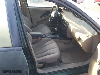 2001 Chevrolet Cavalier with VIN 3G1JC52461S218469, listed as a IAAI auction lot 41000056 with 114,181 mi miles. Bid and sale history available at carsss.com. Image 5.
