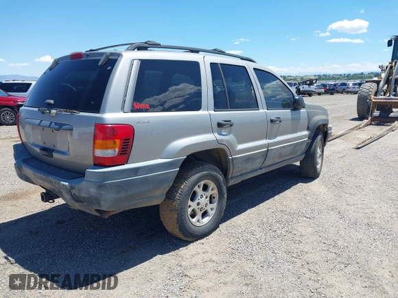 2000 Jeep Grand Cherokee Laredo with VIN 1J4GW48S8YC172274, listed as a IAAI auction lot 39738087 with 335,809 mi miles and . Bid and sale history available at DreamBid. Image 4.