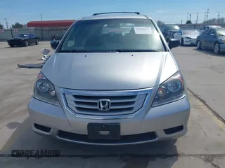 2010 Honda Odyssey LX z VIN 5FNRL3H29AB016884, wystawiony jako IAAI lot #41652673 z przebiegiem 162 068 mil mil oraz . Historia ofert i sprzedaży dostępna na DreamBid. Obrazek 13.