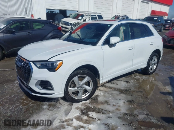 2020 Audi Q3 Premium with VIN WA1AECF31L1098425, listed as a IAAI auction lot 41640806 with 100,462 mi miles and . Bid and sale history available at DreamBid. Image 2.
