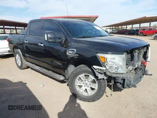 2017 Nissan Titan SV with VIN 1N6AA1E59HN520656, listed as a IAAI auction lot 42339081 with 129,359 mi miles and . Bid and sale history available at DreamBid. Image 1.