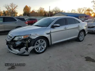 2012 Ford Taurus Limited with VIN 1FAHP2JW8CG143714, listed as a Copart auction lot 81617054 with 167,799 mi miles and Salvage title. Bid and sale history available at DreamBid. Image 1.