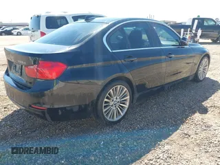 2014 BMW 3 Series 328d with VIN WBA3D3C55EK154125, listed as a IAAI auction lot 41651614 with 193,952 mi miles and . Bid and sale history available at carsss.com. Image 4.