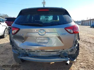 2014 Mazda CX-5 Touring with VIN JM3KE2CY2E0423376, listed as a IAAI auction lot 41650933 with 113,352 mi miles. Bid and sale history available at carsss.com. Image 16.