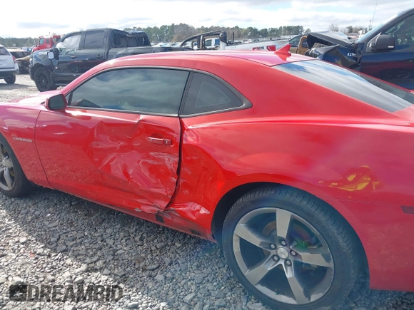 2012 Chevrolet Camaro 1LT z VIN 2G1FB1E3XC9203347, wystawiony jako IAAI lot #41261932 z przebiegiem 106 070 mil mil oraz . Historia ofert i sprzedaży dostępna na DreamBid. Obrazek 6.