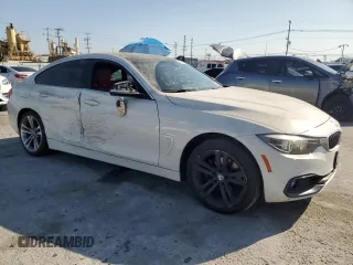 2019 BMW 4 Series 430i xDrive z VIN WBA4J3C56KBL05093, wystawiony jako Copart lot #52215335 z przebiegiem 55 900 mil mil oraz Szkoda całkowita • Salvage title. Historia ofert i sprzedaży dostępna na DreamBid. Obrazek 4.
