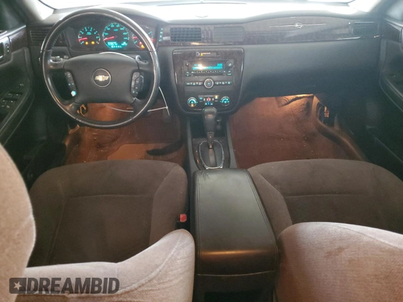 2014 Chevrolet Impala LT with VIN 2G1WB5E3XE1103306, listed as a Copart auction lot 63231005 with 163,901 mi miles and Salvage title. Bid and sale history available at DreamBid. Image 8.