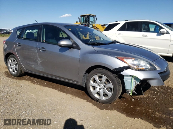 2012 Mazda 3 GX with VIN JM1BL1KF5C1513167, listed as a Copart auction lot 73207624 with 130,995 mi miles and Salvage Title. Bid and sale history available at carsss.com. Image 4.