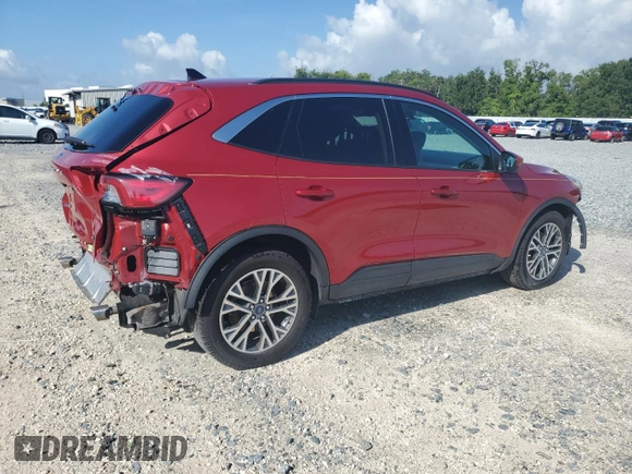 2020 Ford Escape SEL with VIN 1FMCU0H68LUA24470, listed as a Copart auction lot 63121095 with 86,890 mi miles and Salvage title. Bid and sale history available at DreamBid. Image 3.