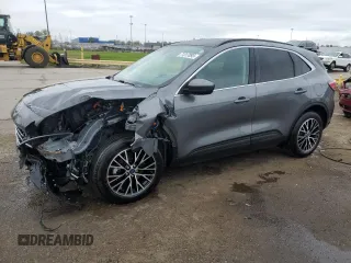 2021 Ford Escape Titanium Plug-In Hybrid z VIN 1FMCU0LZ8MUA91184, wystawiony jako Copart lot #71317093 z przebiegiem 35 494 mil mil oraz . Historia ofert i sprzedaży dostępna na DreamBid. Obrazek 1.