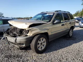 2001 Jeep Grand Cherokee Laredo z VIN 1J4GW48S51C513734, wystawiony jako Copart lot #59365475 z przebiegiem 236 803 mil mil oraz Szkoda całkowita • Salvage title. Historia ofert i sprzedaży dostępna na DreamBid. Obrazek 1.