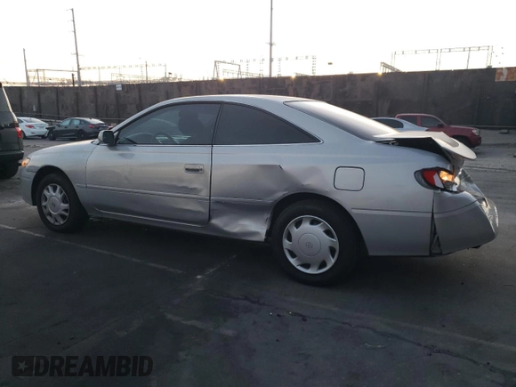 2001 Toyota Solara SE with VIN 2T1CG22P61C464416, listed as a Copart auction lot 86124324 with 239,080 mi miles and Salvage Title. Bid and sale history available at carsss.com. Image 2.
