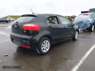 2013 Kia Rio LX with VIN KNADM5A35D6302623, listed as a IAAI auction lot 41626083 with 114,132 mi miles. Bid and sale history available at carsss.com. Image 4.