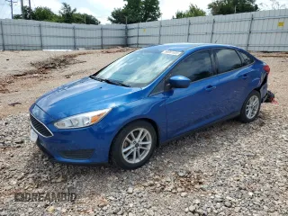2018 Ford Focus SE z VIN 1FADP3FE4JL277404, wystawiony jako Copart lot #59381655 z przebiegiem 95 179 mil mil oraz Szkoda całkowita • Salvage title. Historia ofert i sprzedaży dostępna na DreamBid. Obrazek 1.