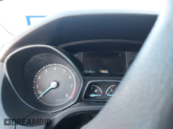 2015 Ford Focus SE with VIN 1FADP3K23FL261021, listed as a IAAI auction lot 42014802 with 157,283 mi miles. Bid and sale history available at carsss.com. Image 7.