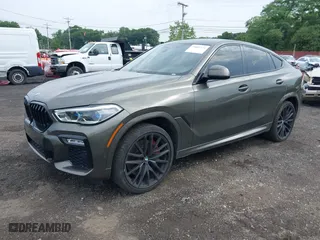 2021 BMW X6 M50i with VIN 5UXCY8C03M9D80163, listed as a IAAI auction lot 39885522 with 48,533 mi miles. Bid and sale history available at carsss.com. Image 18.