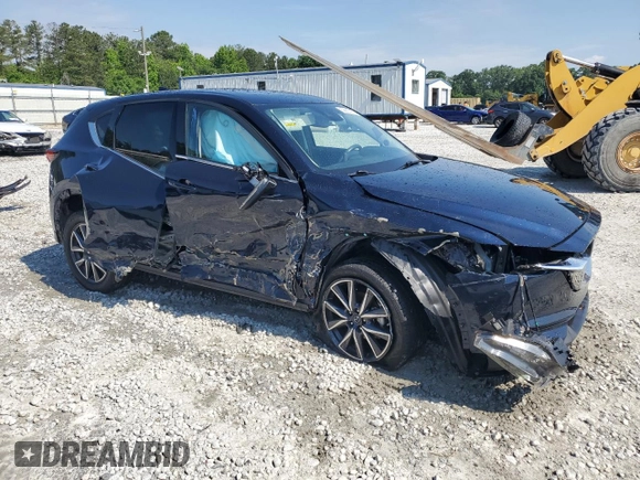 2018 Mazda CX-5 Grand Touring z VIN JM3KFADM5J1420690, wystawiony jako Copart lot #56897875 z przebiegiem 46 483 mil mil oraz Szkoda całkowita • Salvage title. Historia ofert i sprzedaży dostępna na DreamBid. Obrazek 4.