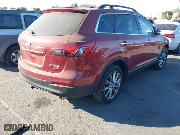 2014 Mazda CX-9 Grand Touring with VIN JM3TB3DV6E0435389, listed as a IAAI auction lot 41406200 with 181,598 mi miles and . Bid and sale history available at DreamBid. Image 4.