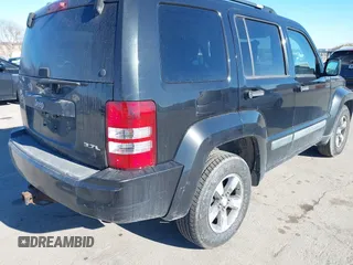 2008 Jeep Liberty Sport with VIN 1J8GP28K38W227910, listed as a IAAI auction lot 41244738 with 215,126 mi miles. Bid and sale history available at carsss.com. Image 4.