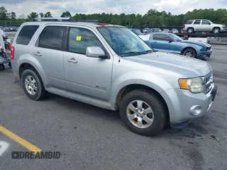 2009 Ford Escape Hybrid z VIN 1FMCU49399KB18857, wystawiony jako IAAI lot #42502324 z przebiegiem 227 828 mil mil oraz . Historia ofert i sprzedaży dostępna na DreamBid. Obrazek 1.